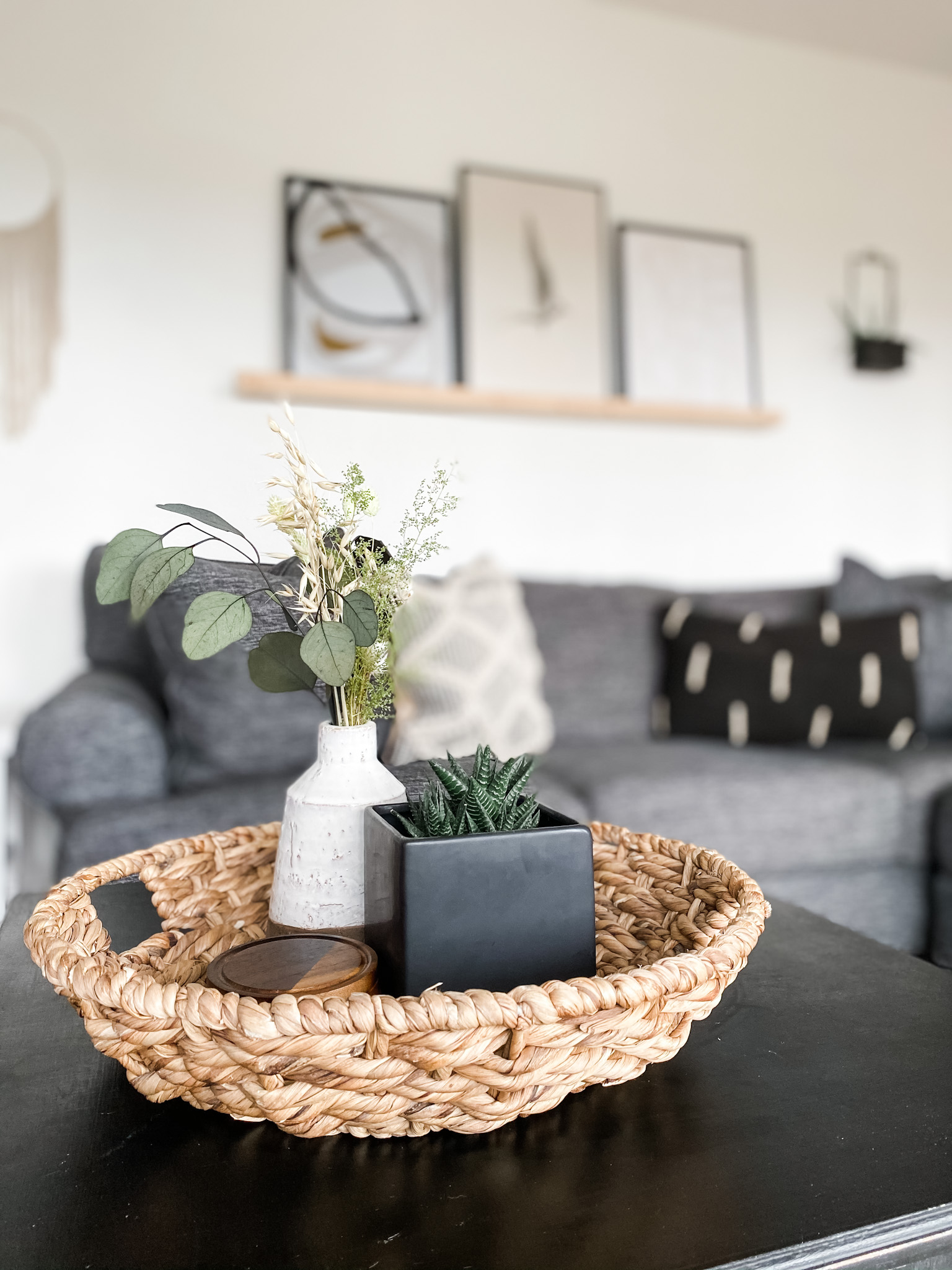 coffee table styling with basket vases and plants