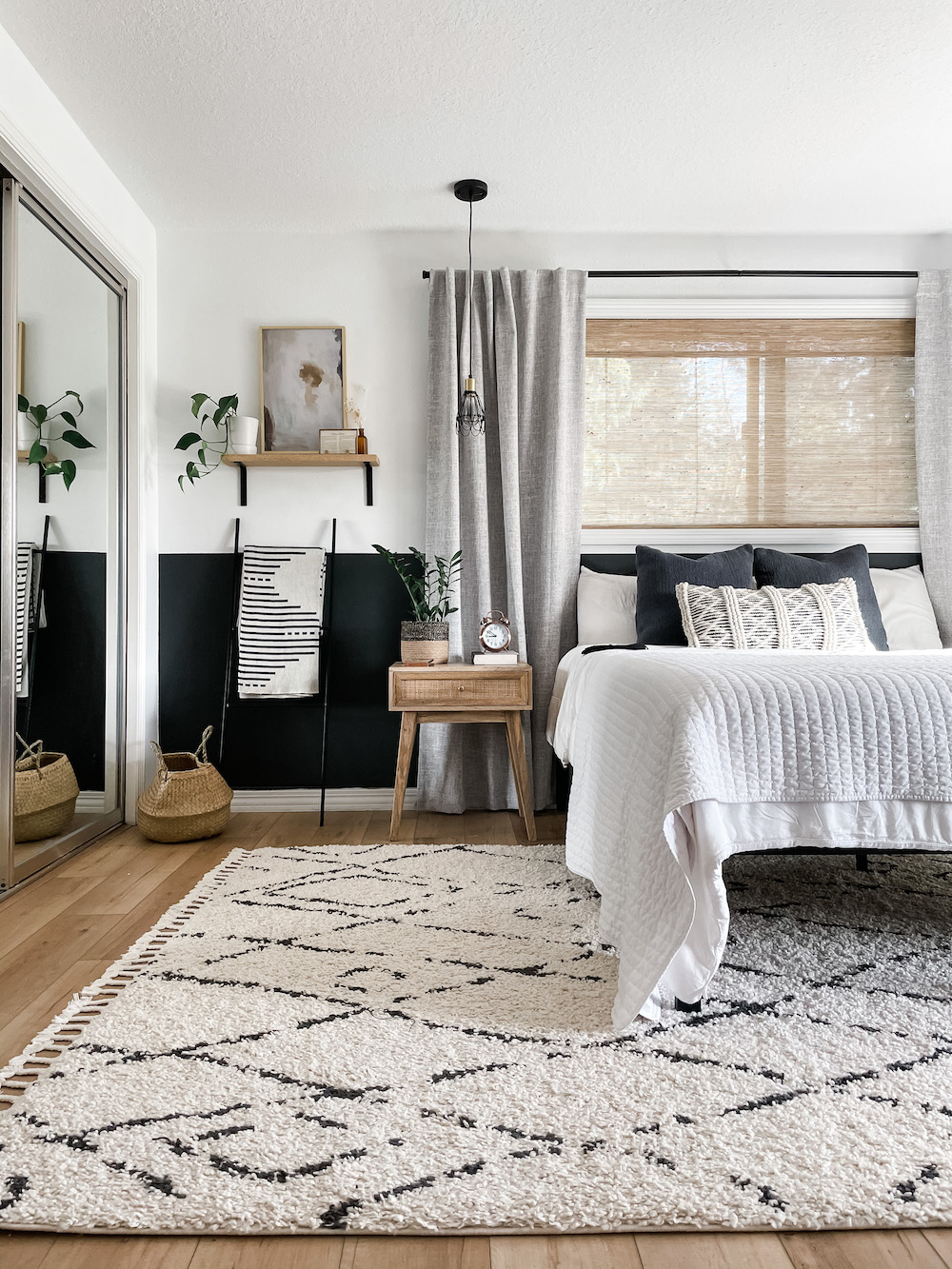 bedroom with color block black wall