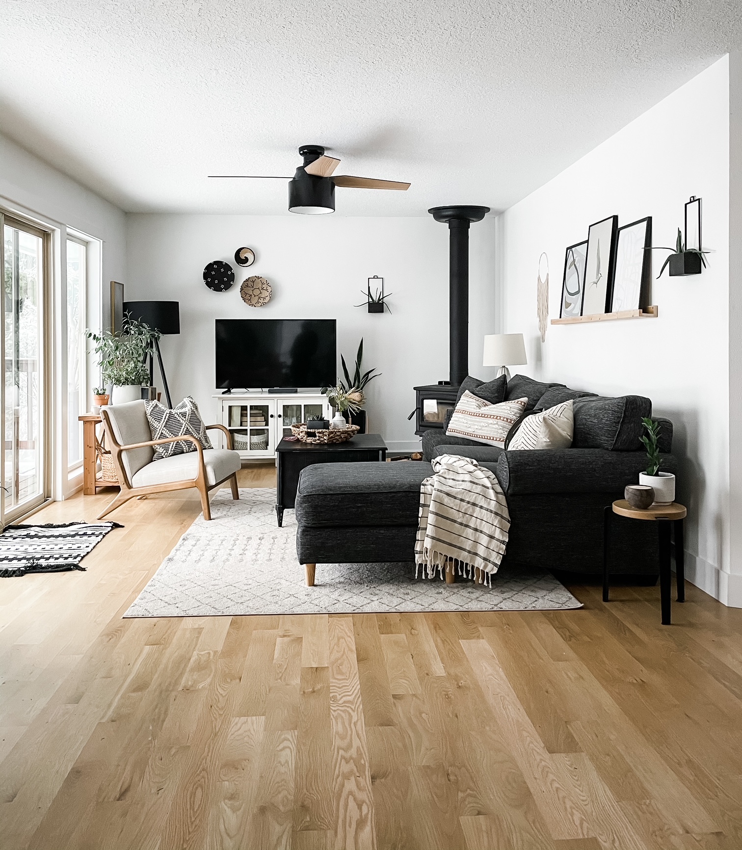 neutral family room with black couch
