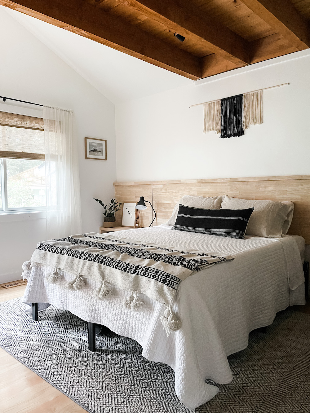 bedroom with bed and large area rug