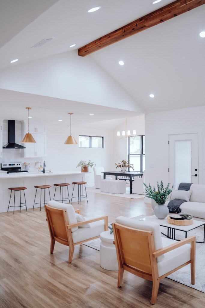 open floor plan home with living room, kitchen, and dining room