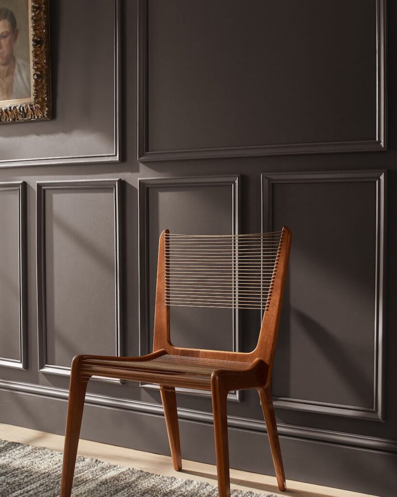dark brown paneled wall with benjamin moore paint color of the year silhouette
